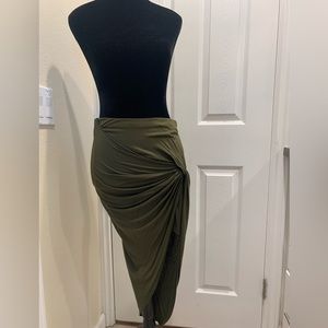 Dark green, fitted, side knot midi skirt.